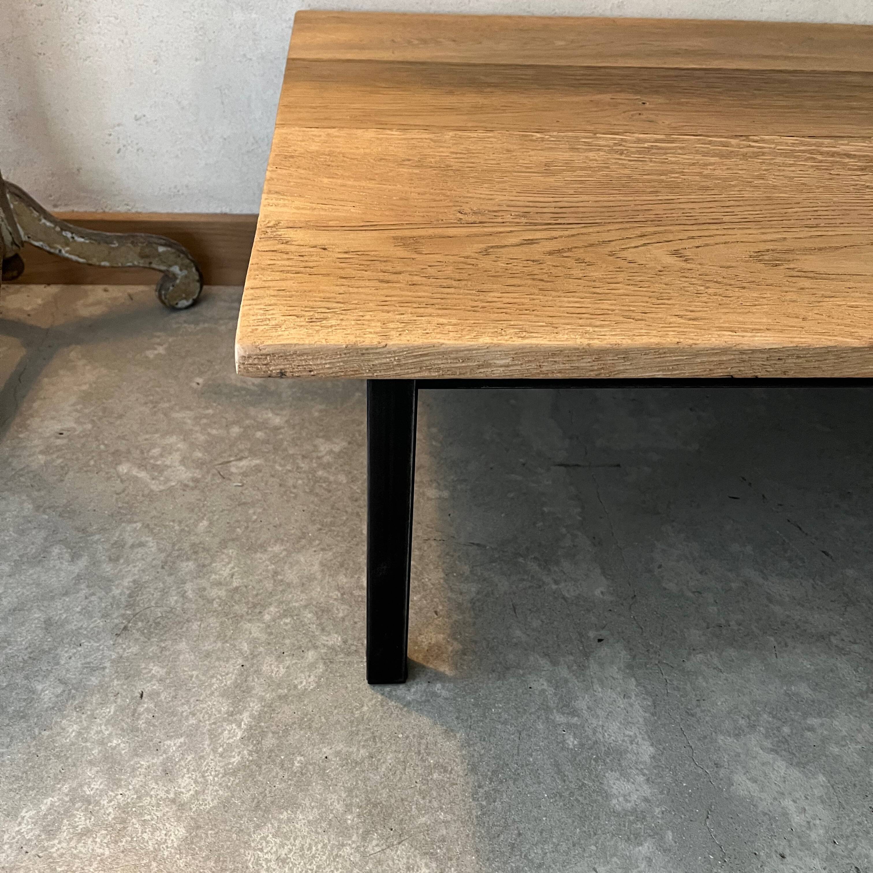 Wooden coffee table with metal legs