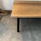 Wooden coffee table with metal legs