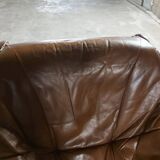 Armchairs in leather and vintage wood 70's