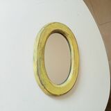 Small antique oval mirror