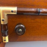 Vintage wooden and gilded chest of drawers colonial style