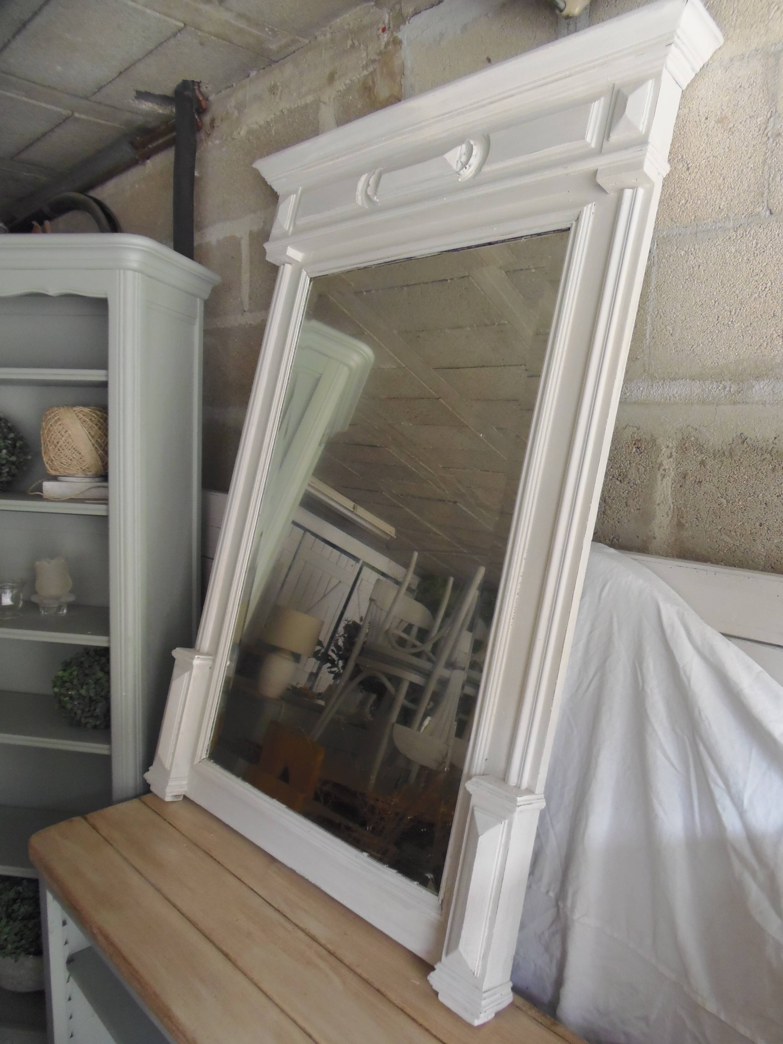 Antique bevelled mirror, frame in pearl grey patinated wood.