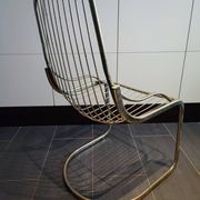 Chaise métallique tubulaire recouverte de dorure