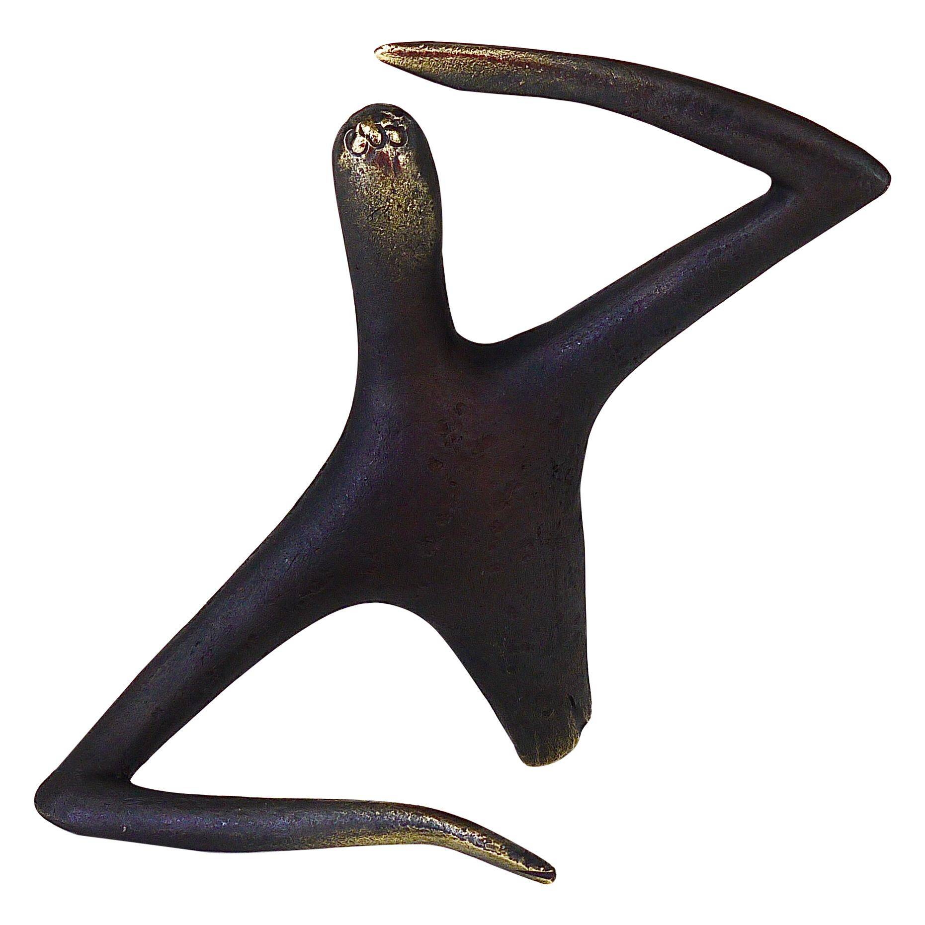 Handmade brass sculpture by Carl Auböck, Optimist Pessimist, model no. 4059.