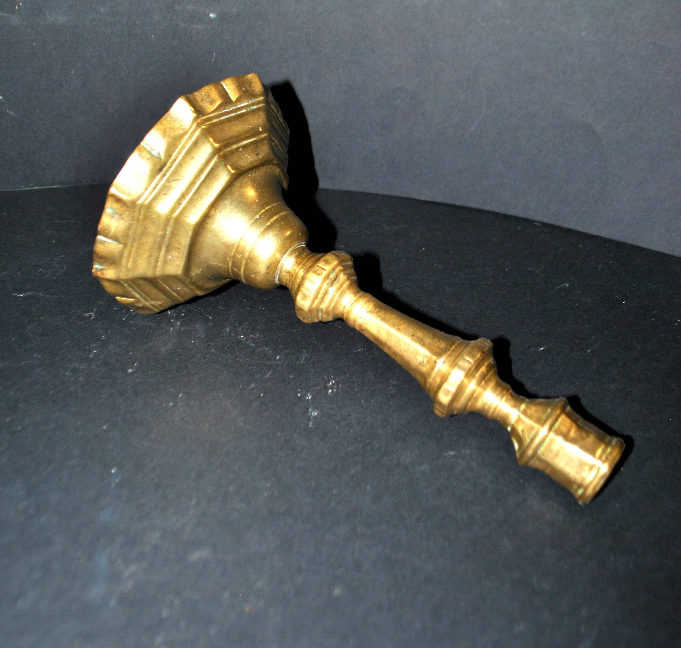 Antique 18th-century octagonal cut-out bronze candlestick in the Louis XIV style.