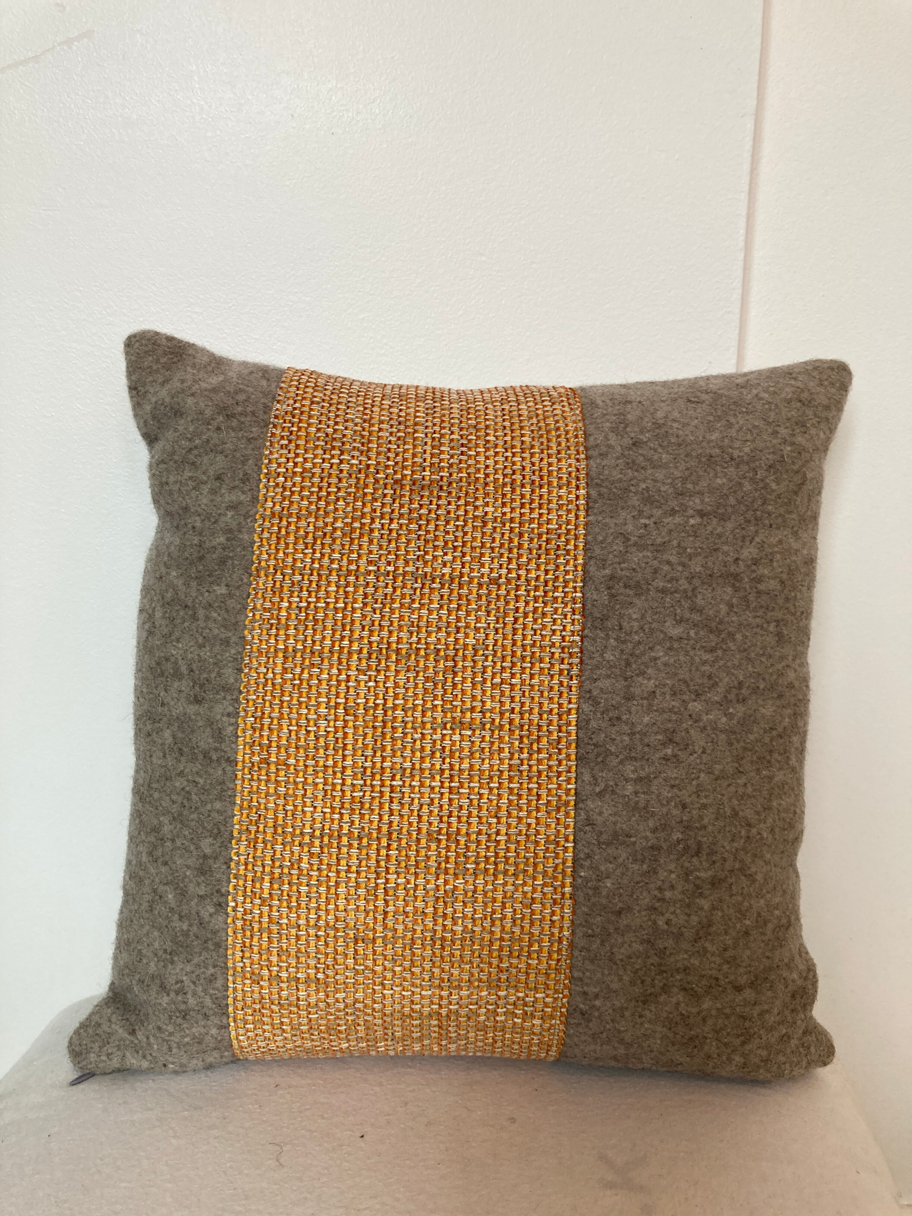 Bi-sided cushion gray wool yoke orange fabric