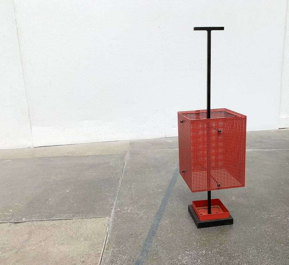 Minimalist perforated steel umbrella stand, 1960s