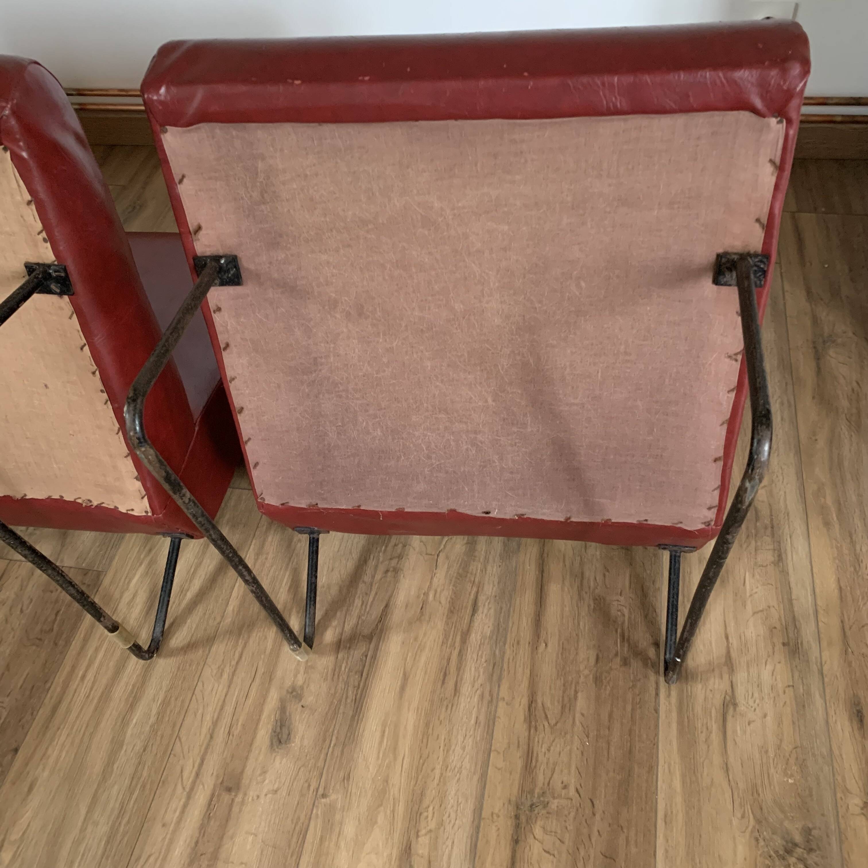 Pair of vintage burgundy red armchairs