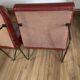 Paire de fauteuils vintage rouge bordeaux