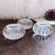 Trio of salt shakers, pepper shakers, molded glass salt shakers