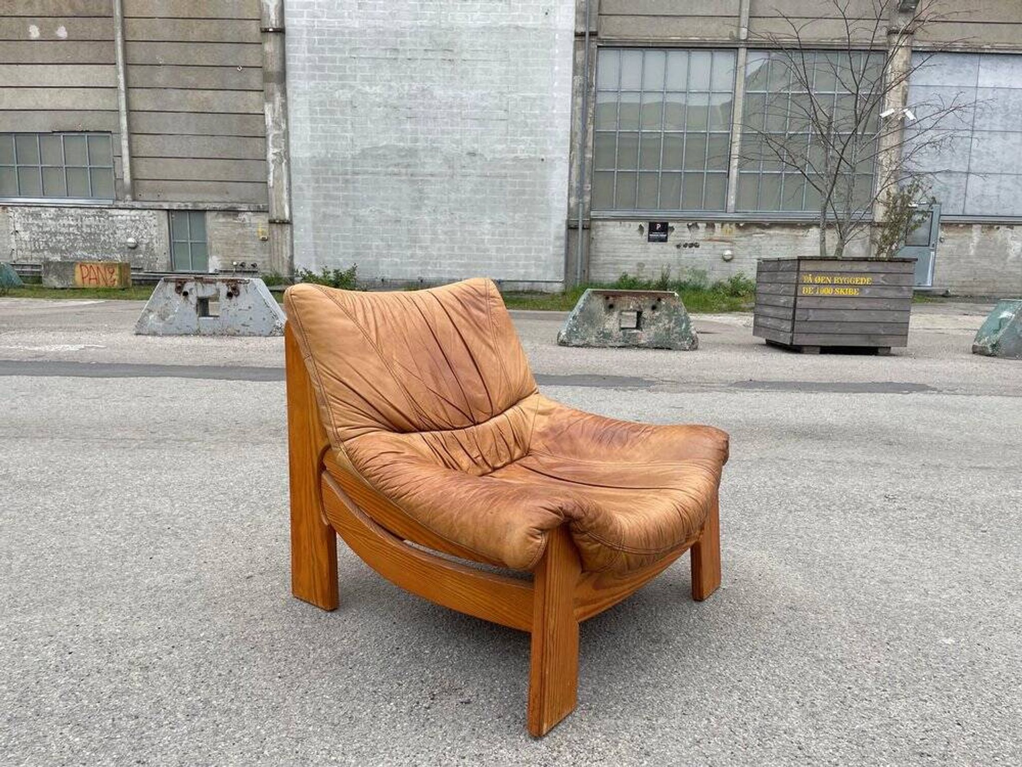 Vintage leather and pine lounge chair by Maison Regain, 1970s