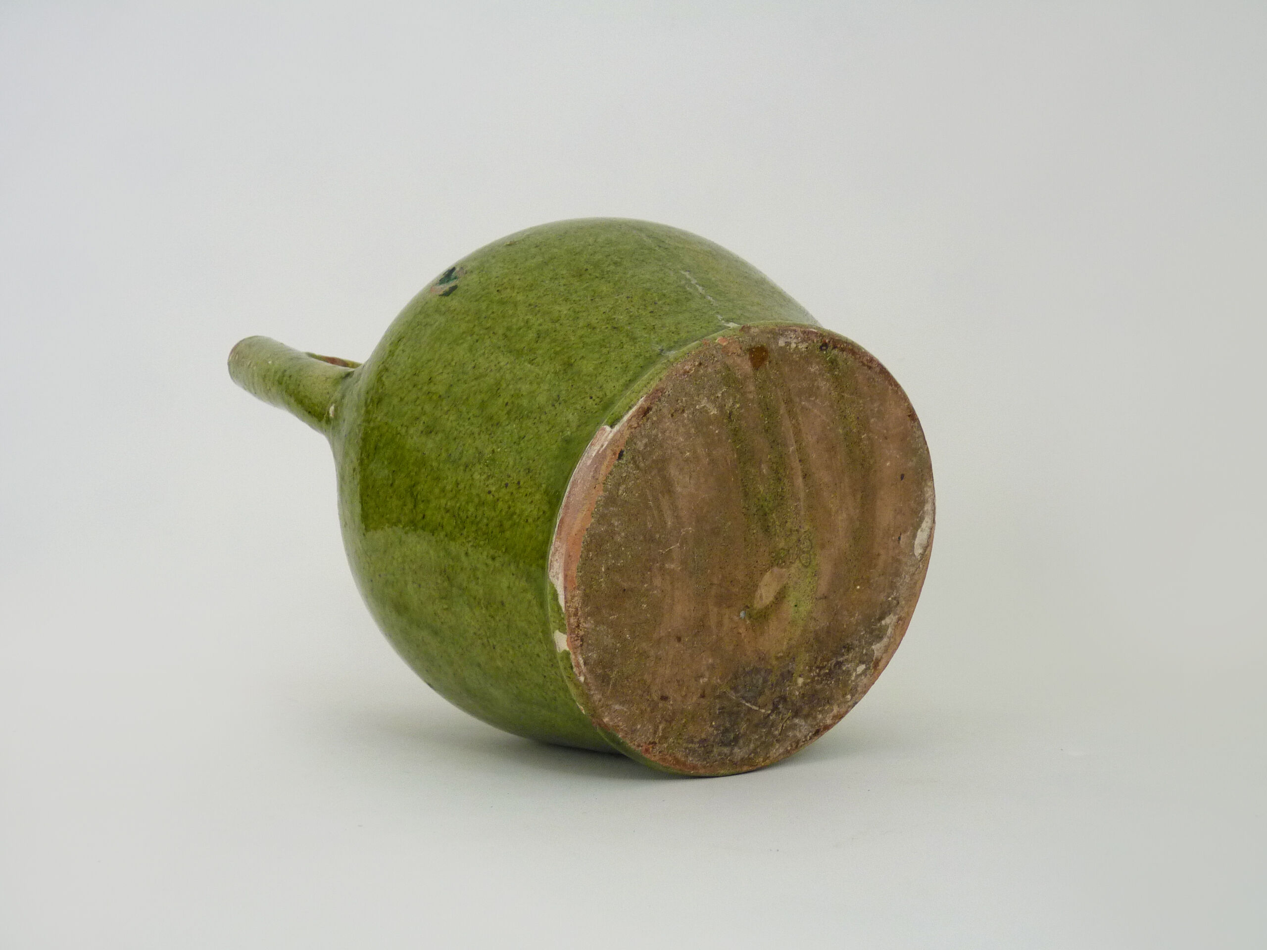 Orjol water pitcher pottery in green glazed terracotta. Pyrenees XIXth