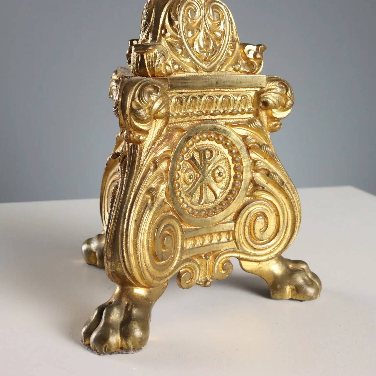 Antique gilded bronze candelabrum, 19th-century decorations.