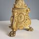 Antique gilded bronze candelabrum, 19th-century decorations.