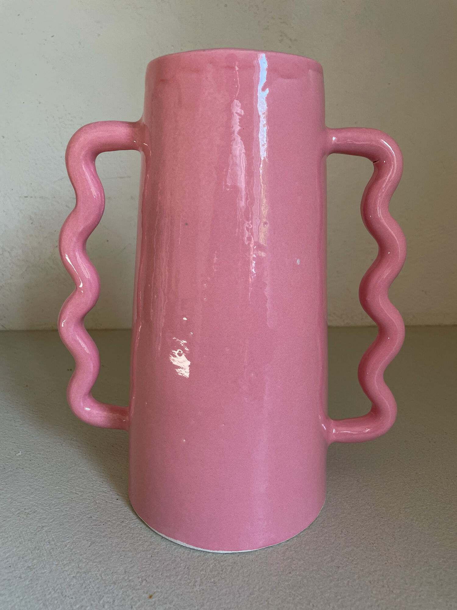 Handmade abstract corrugated handle pink ceramic vase