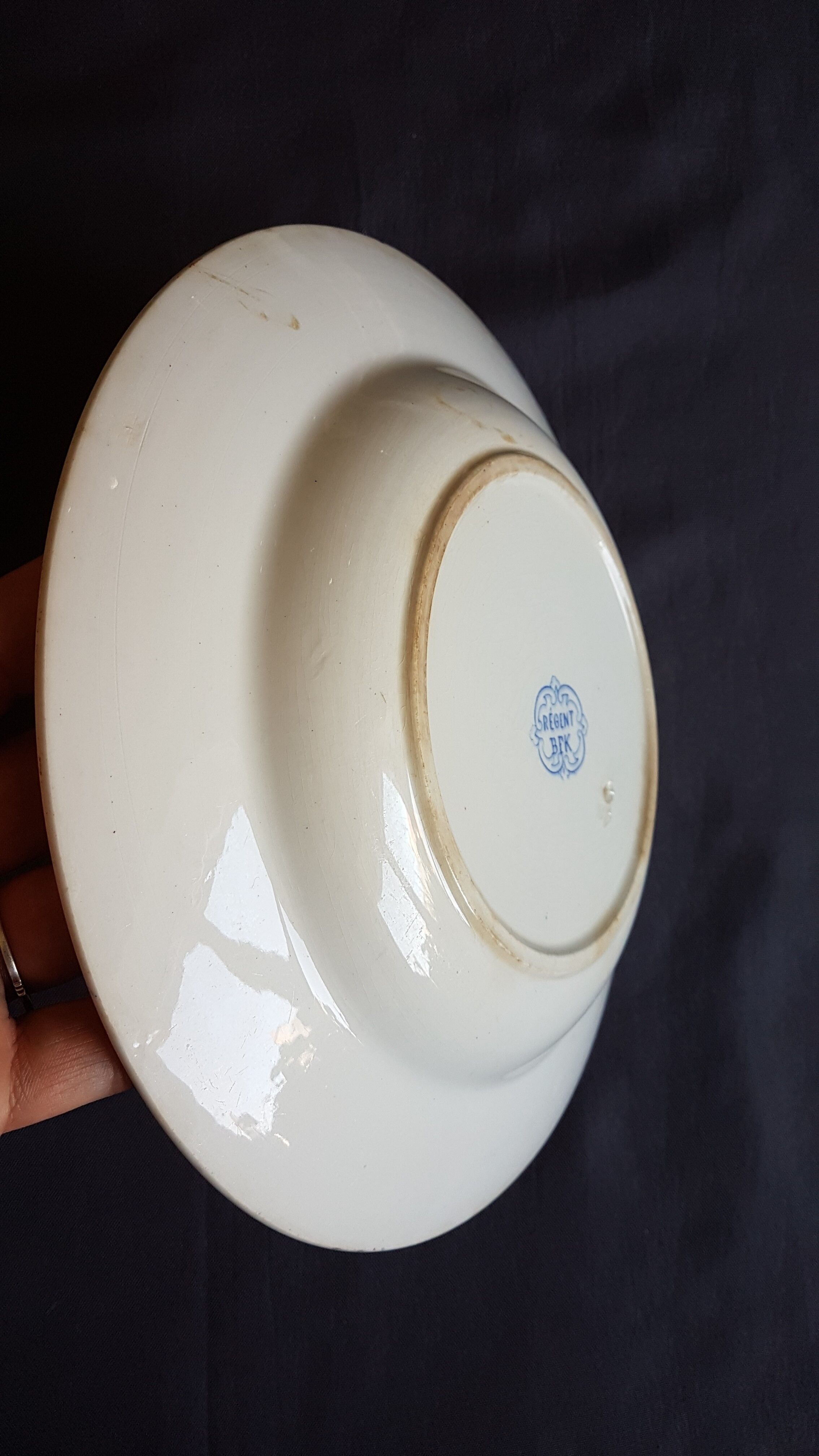 Hollow plate in earthenware decorated with flowers