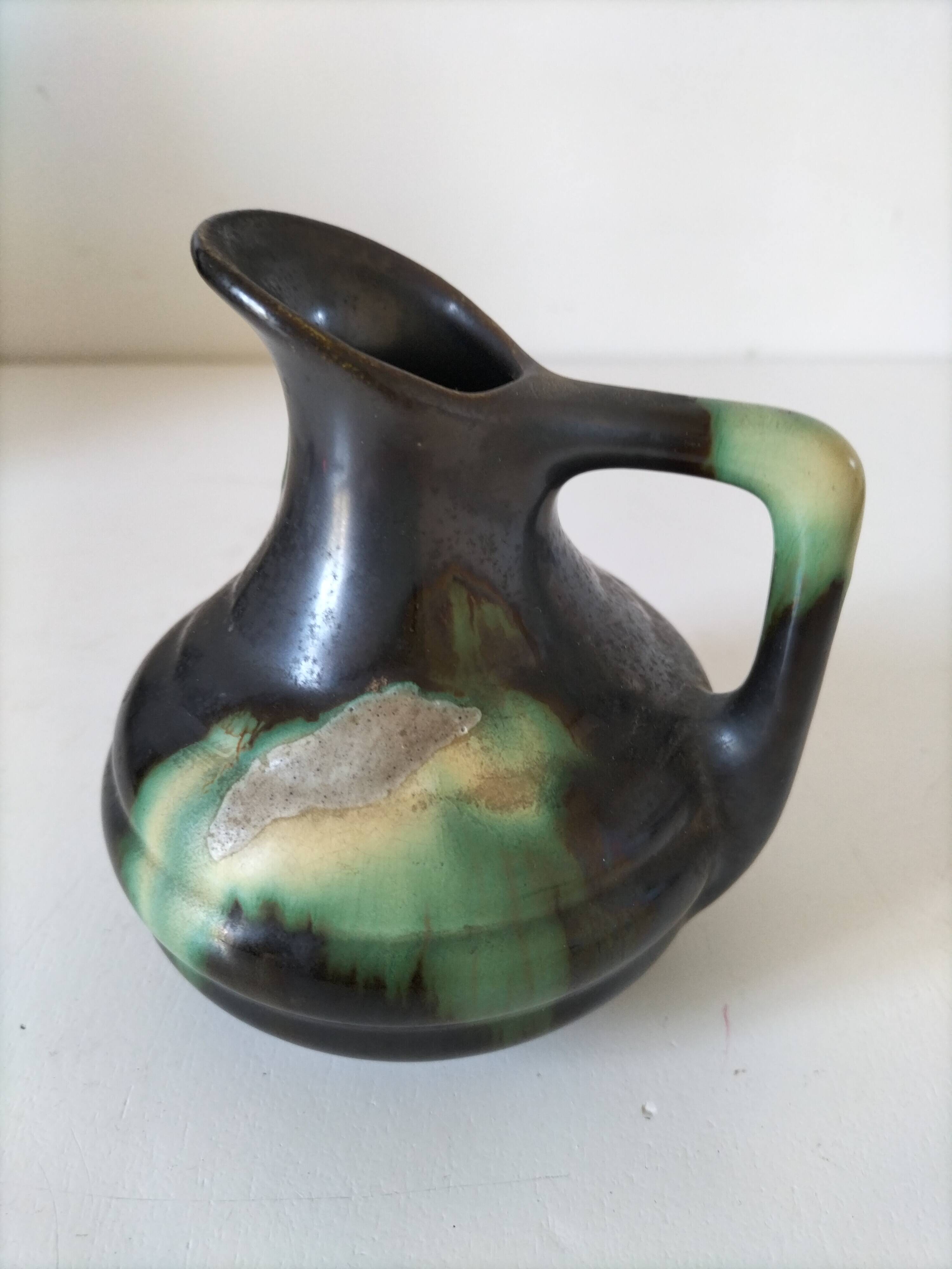 Ceramic pitcher Thulin Belgium flamed green black enamel