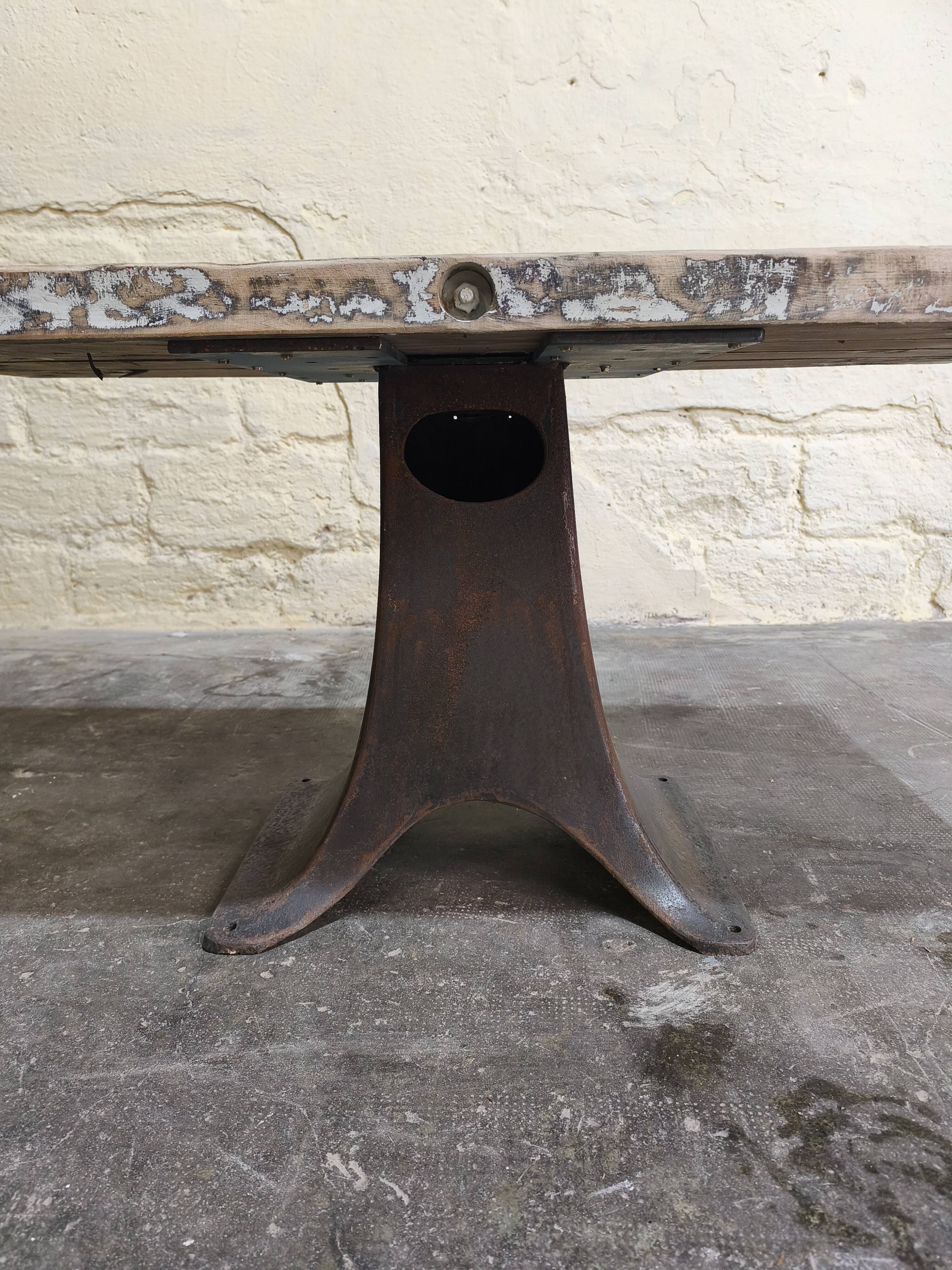Solid oak coffee table with industrial cast iron legs