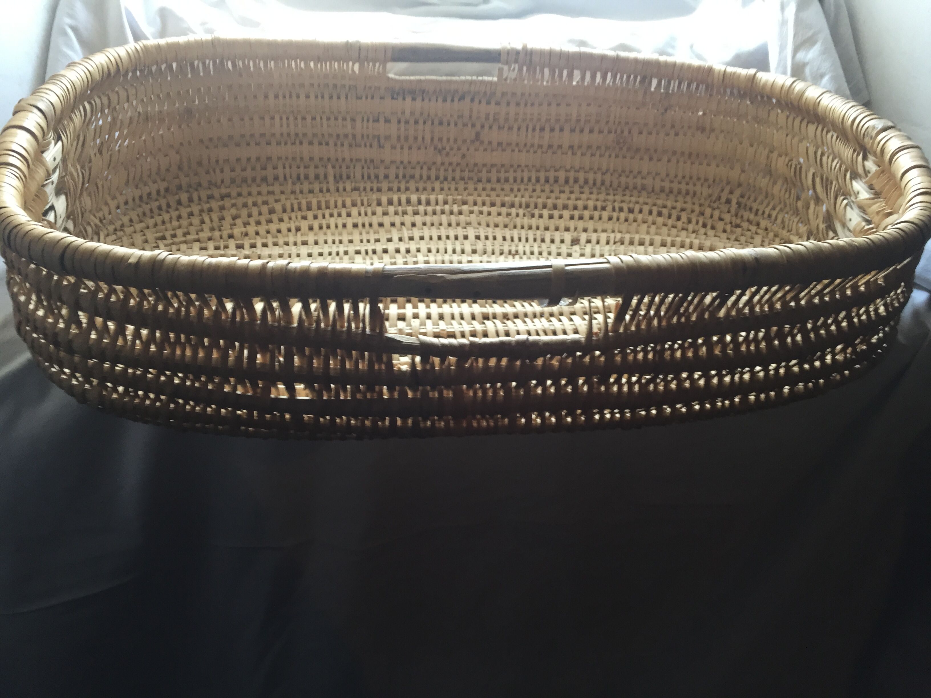 Old wicker linen pan