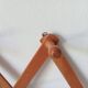 Vintage accordion wall coat rack