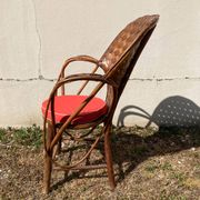 Vintage 1970s armchair in curved woven chestnut + seat cushion