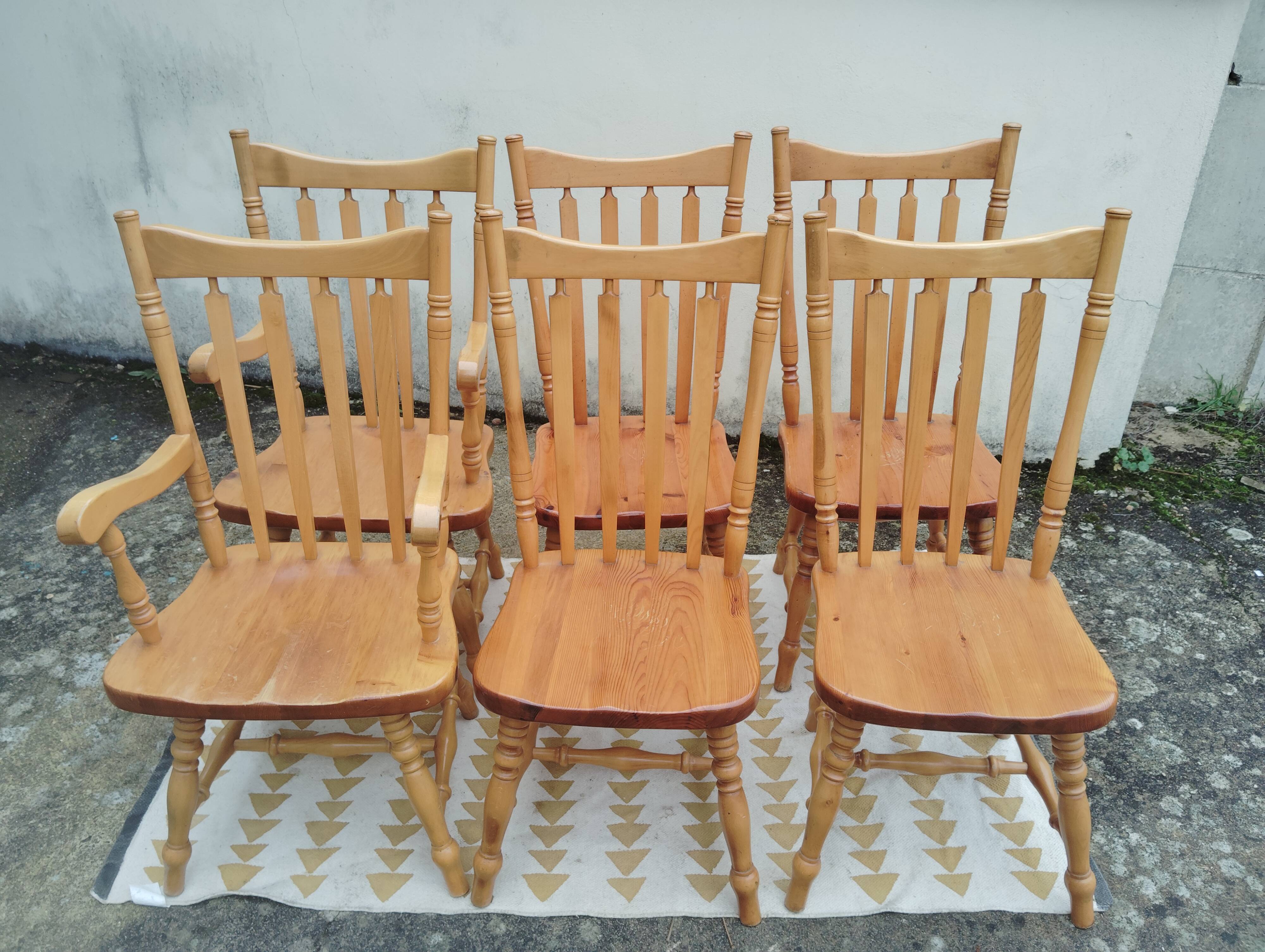 Set of 6 western bistro chairs, including 2 with armrests.