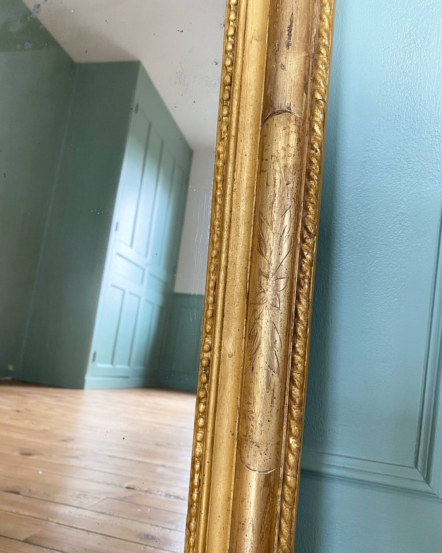 Louis-Philippe mirror gilded with gold leaf