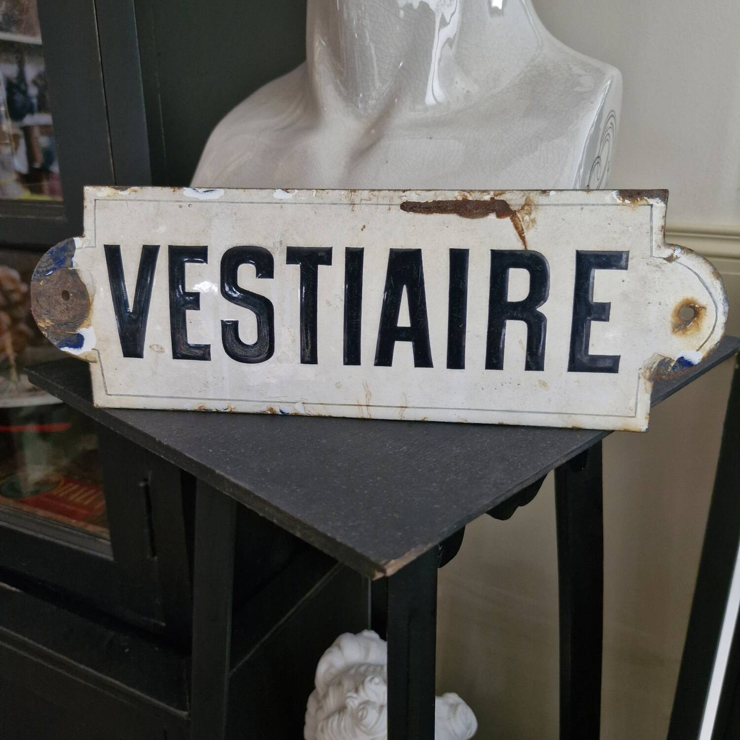 Enameled “locker room” plaque