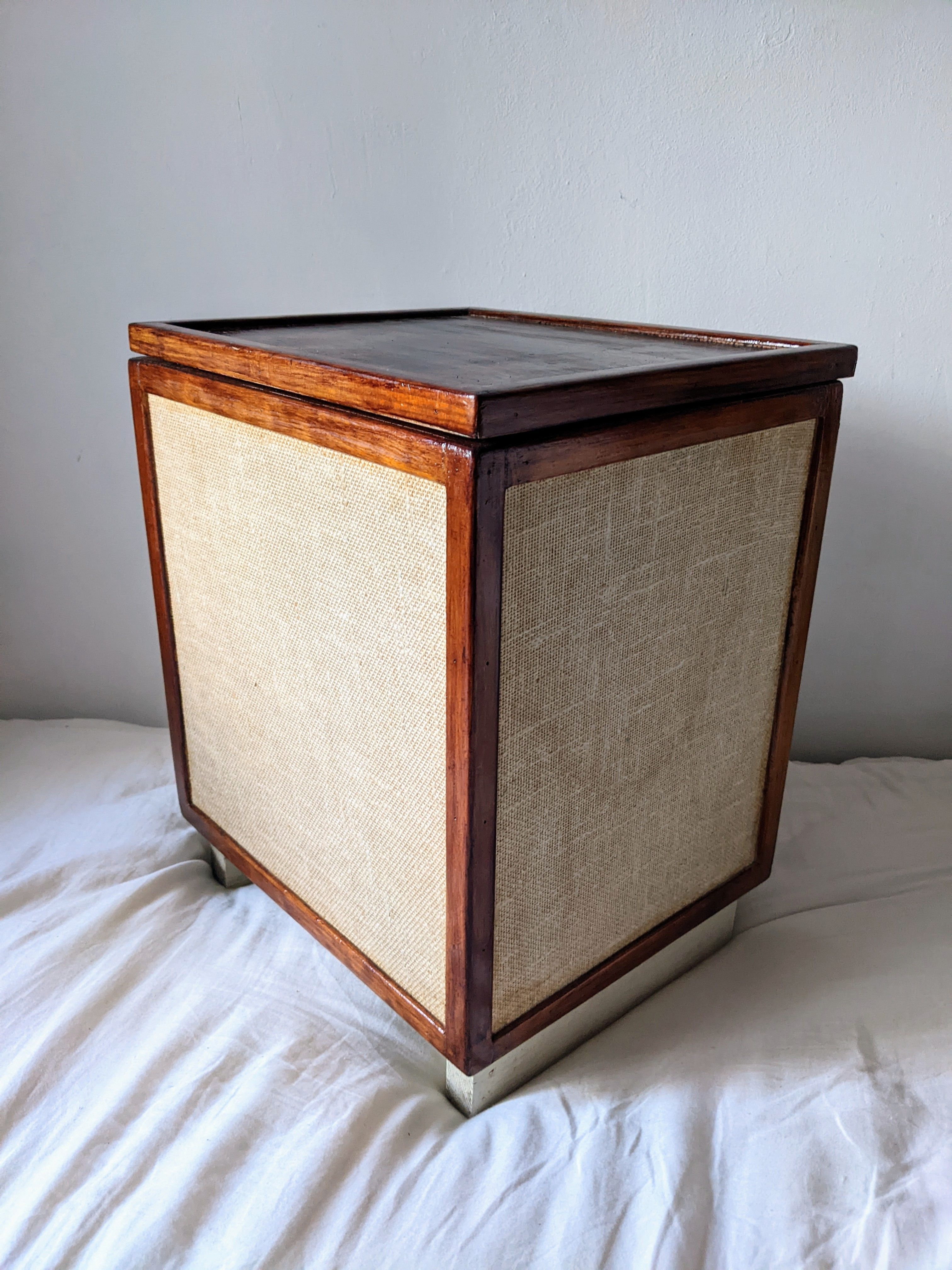 Burlap chest and varnished wood