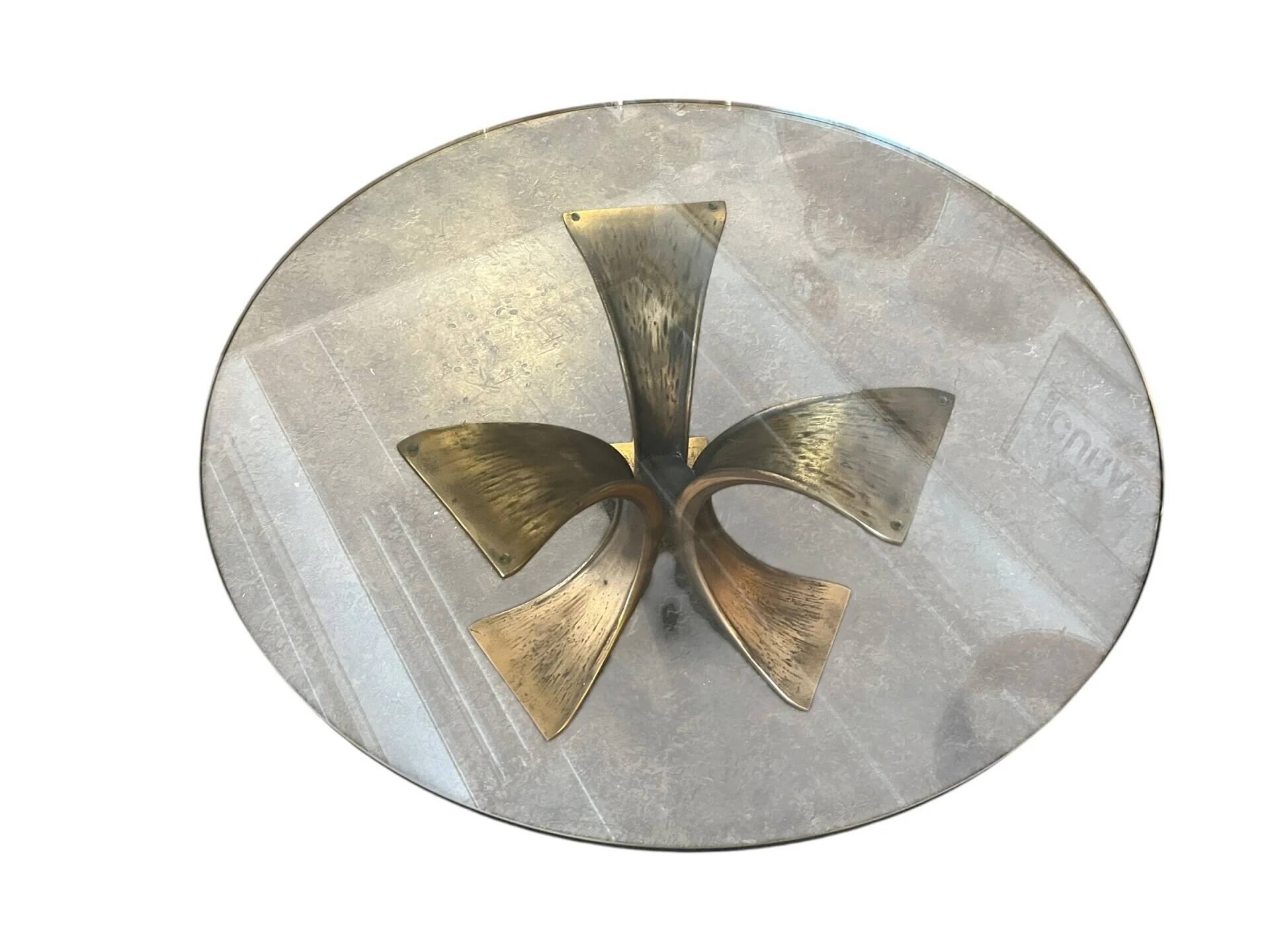 Coffee table in bronze with glass top by Luciano Frigerio