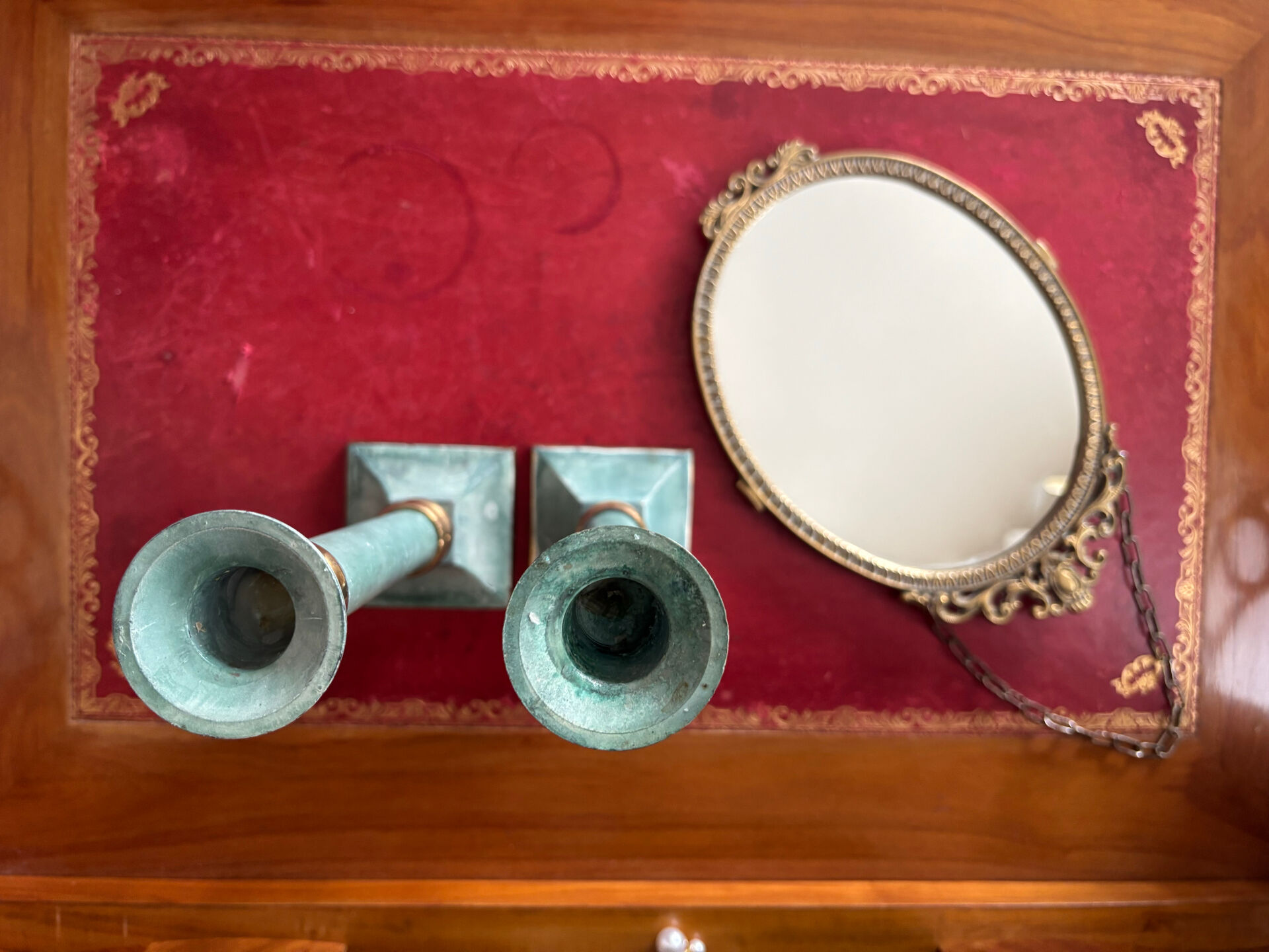 Exceptional pair of large candlesticks in patinated greenish-blue brass.