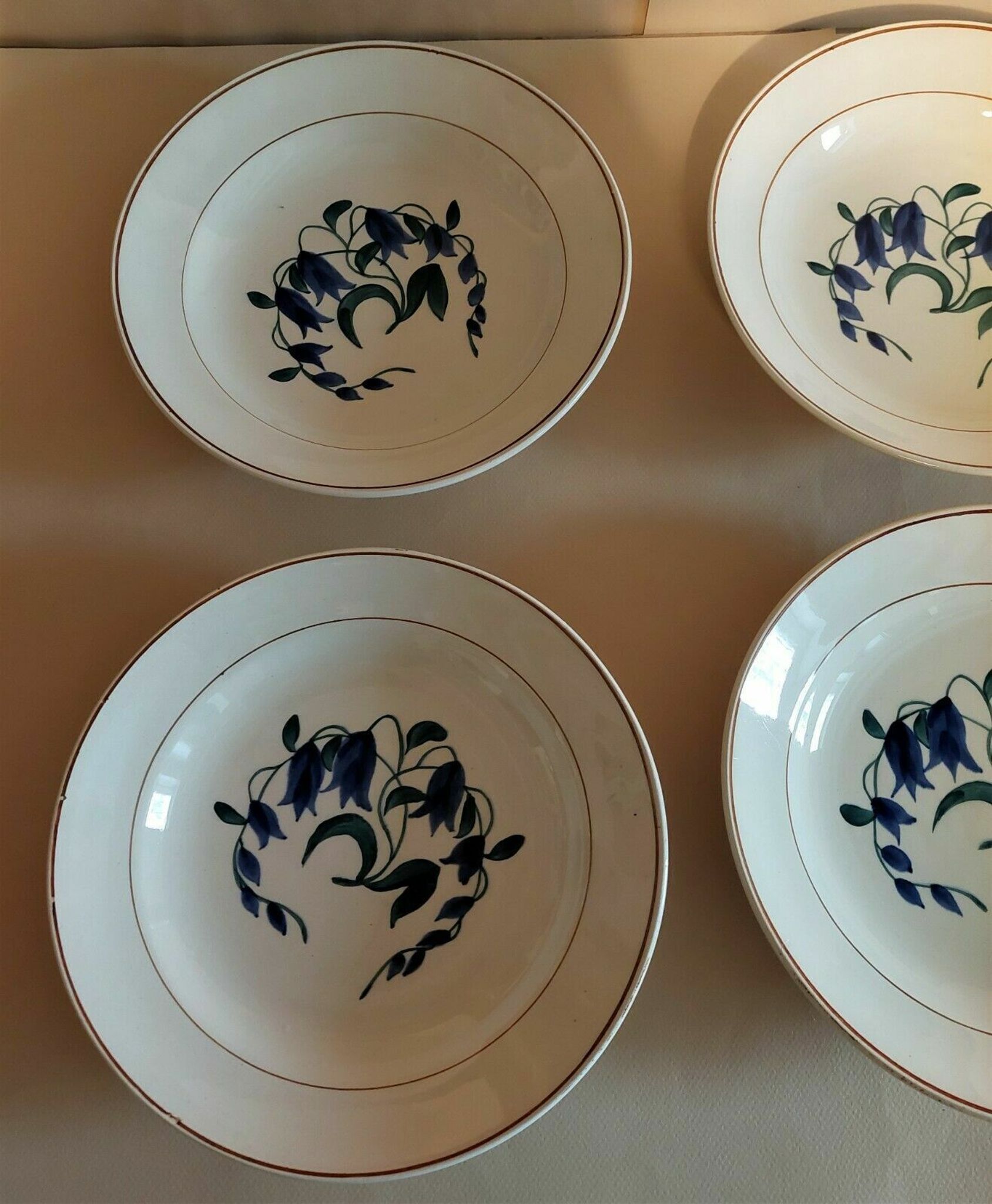 Assiettes creuses série de six faïence de Longchamp décor Simone