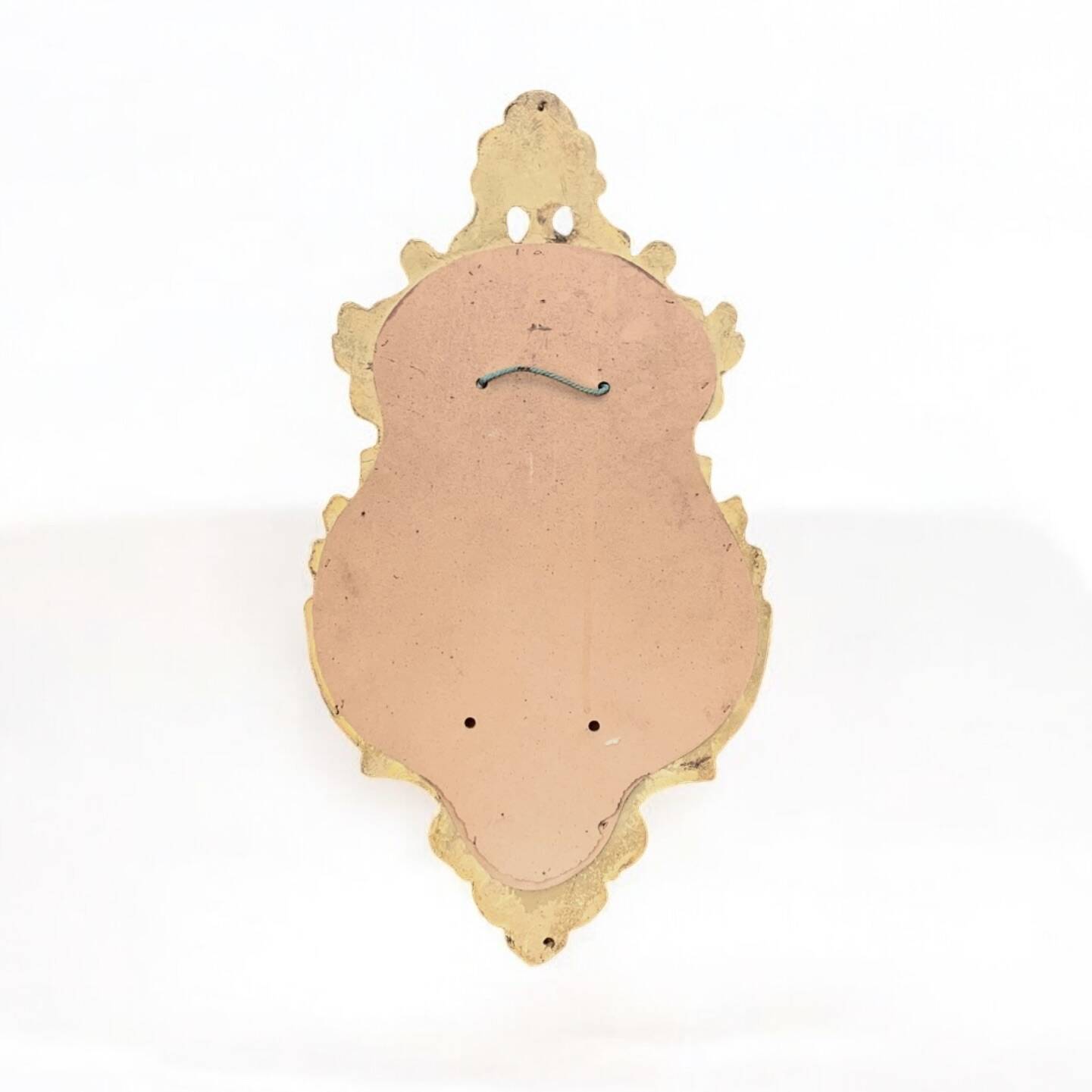 Antique wall mirror in gold leaf resin