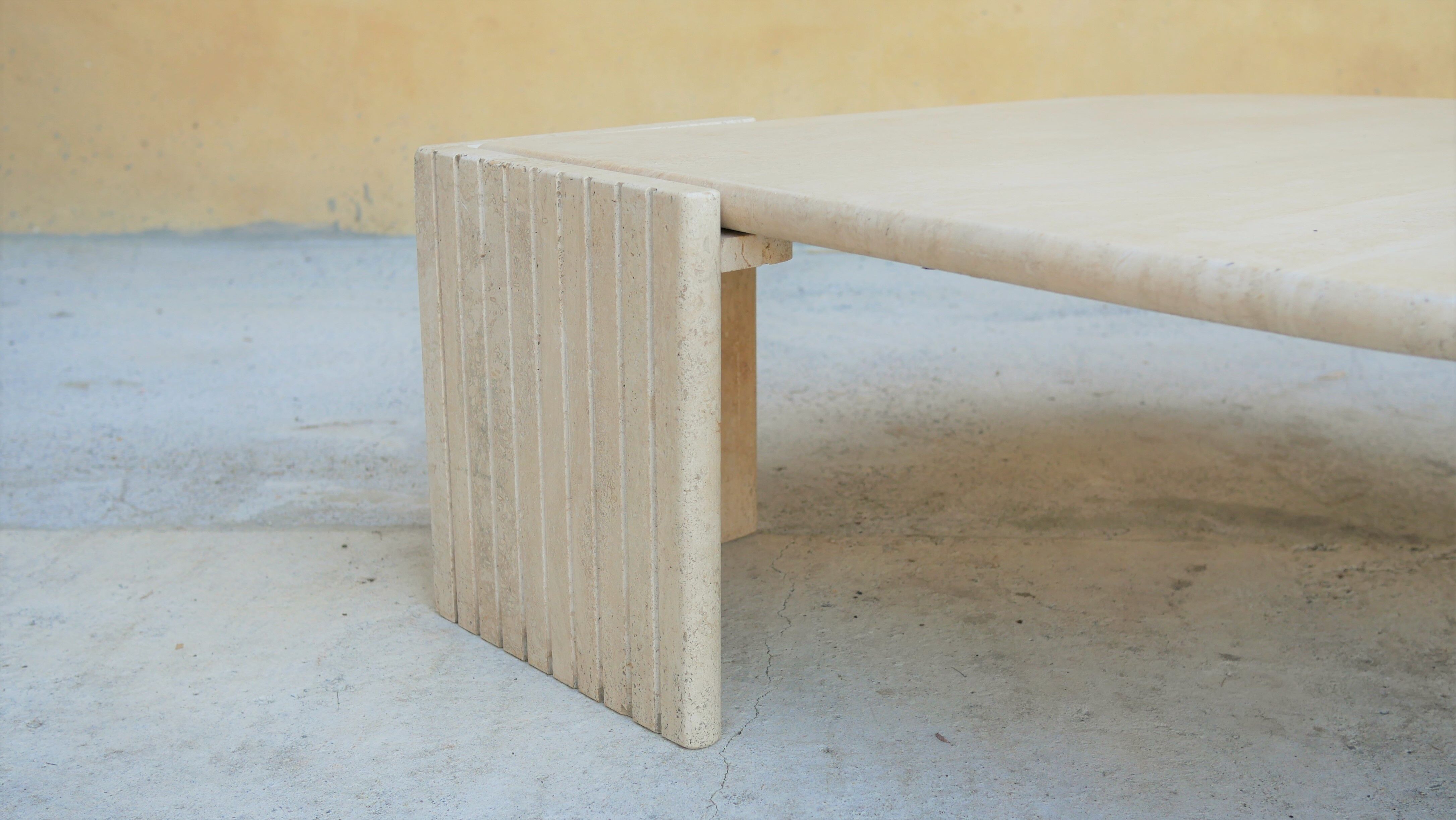 Coffee table in travertine by Roche Bobois editions
