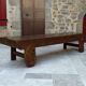 Important banc indonésien en bois sculpté, Début XXe