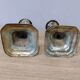 Pair of silver metal candle holders