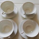 4 fine porcelain tea cups and saucers