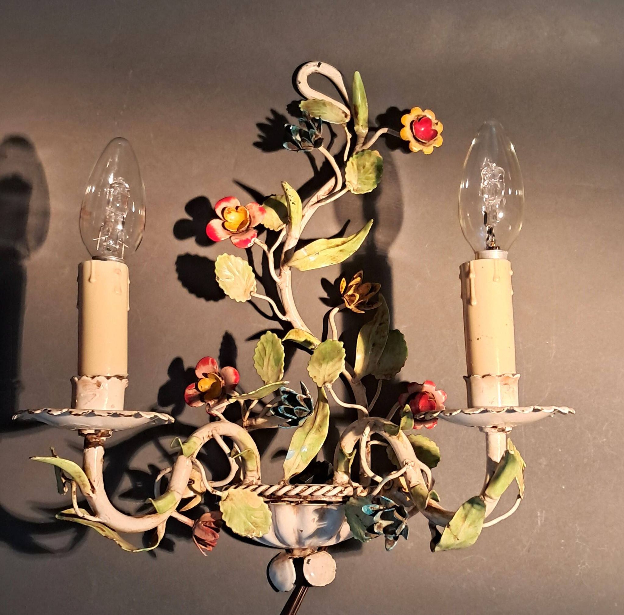 Two-light polychrome painted wrought iron wall lights, Italy 1950/1960.