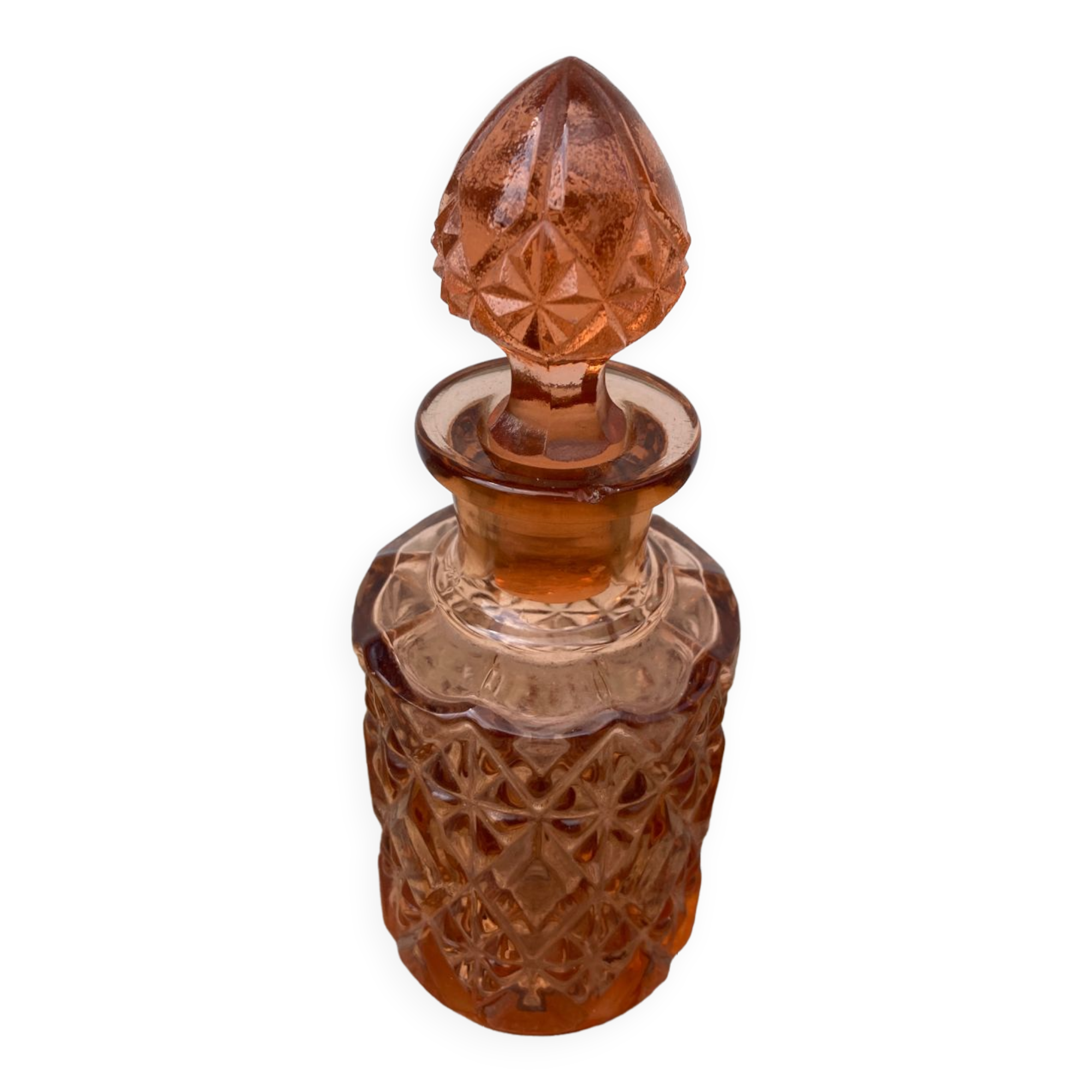 Art Deco perfume bottle in old amber pink glass