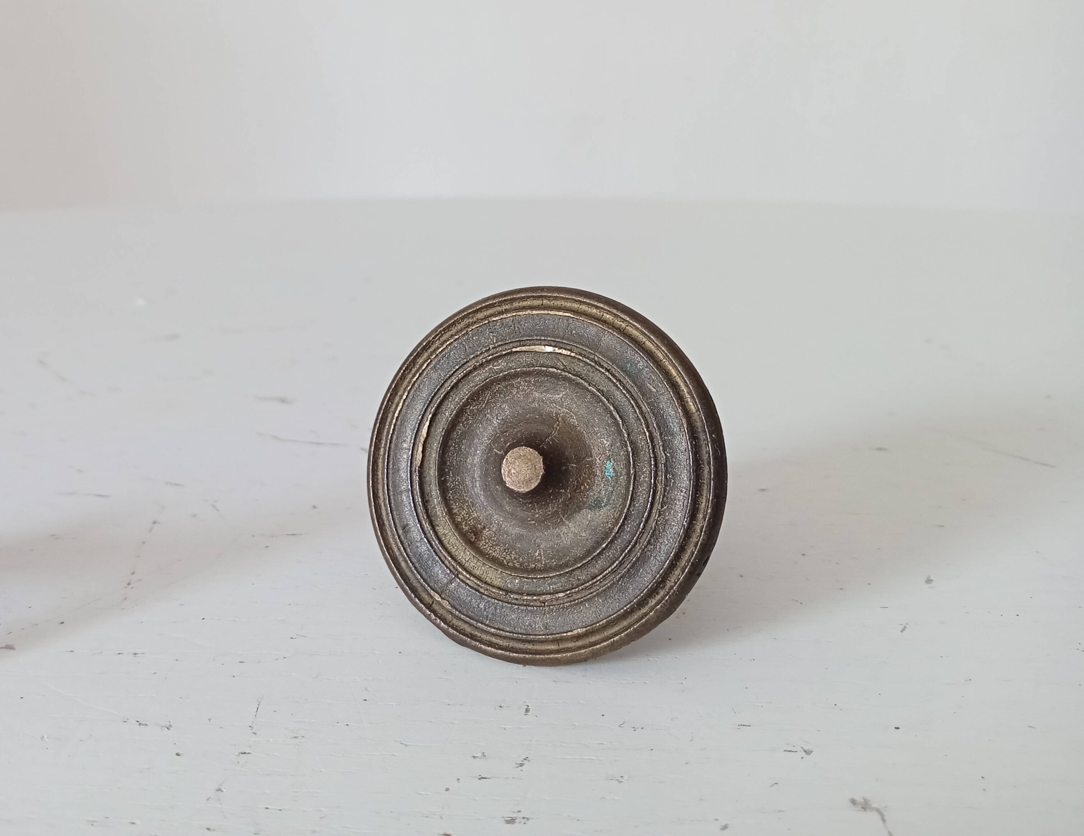 Pair of antique Empire furniture knobs from the 19th century.