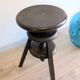 Antique wooden watchmaker's stool with screws, patinated wood.