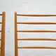 Series of 4 vintage chairs in wood and skaï