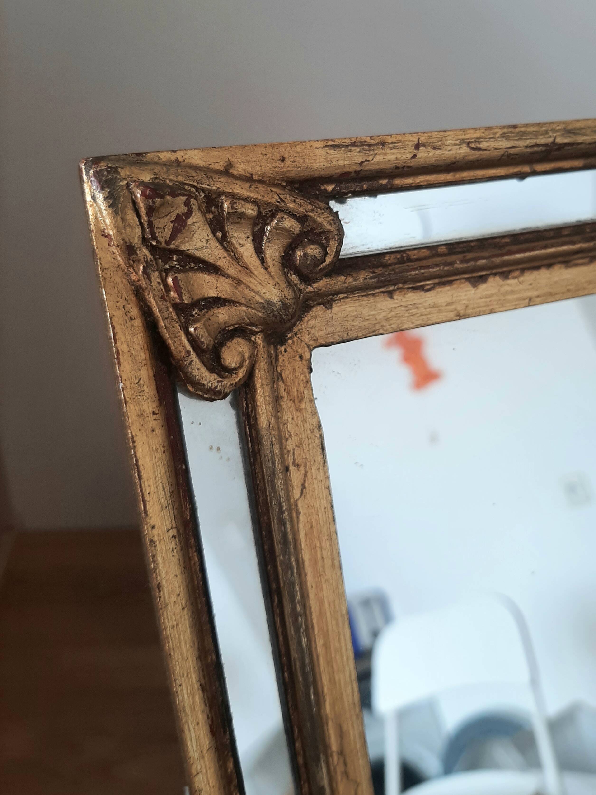 Gold-framed mirror