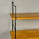 Vintage wall shelf with three wood veneer shelves
