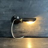 Old black metal and brass wall light, adjustable, 1930s.