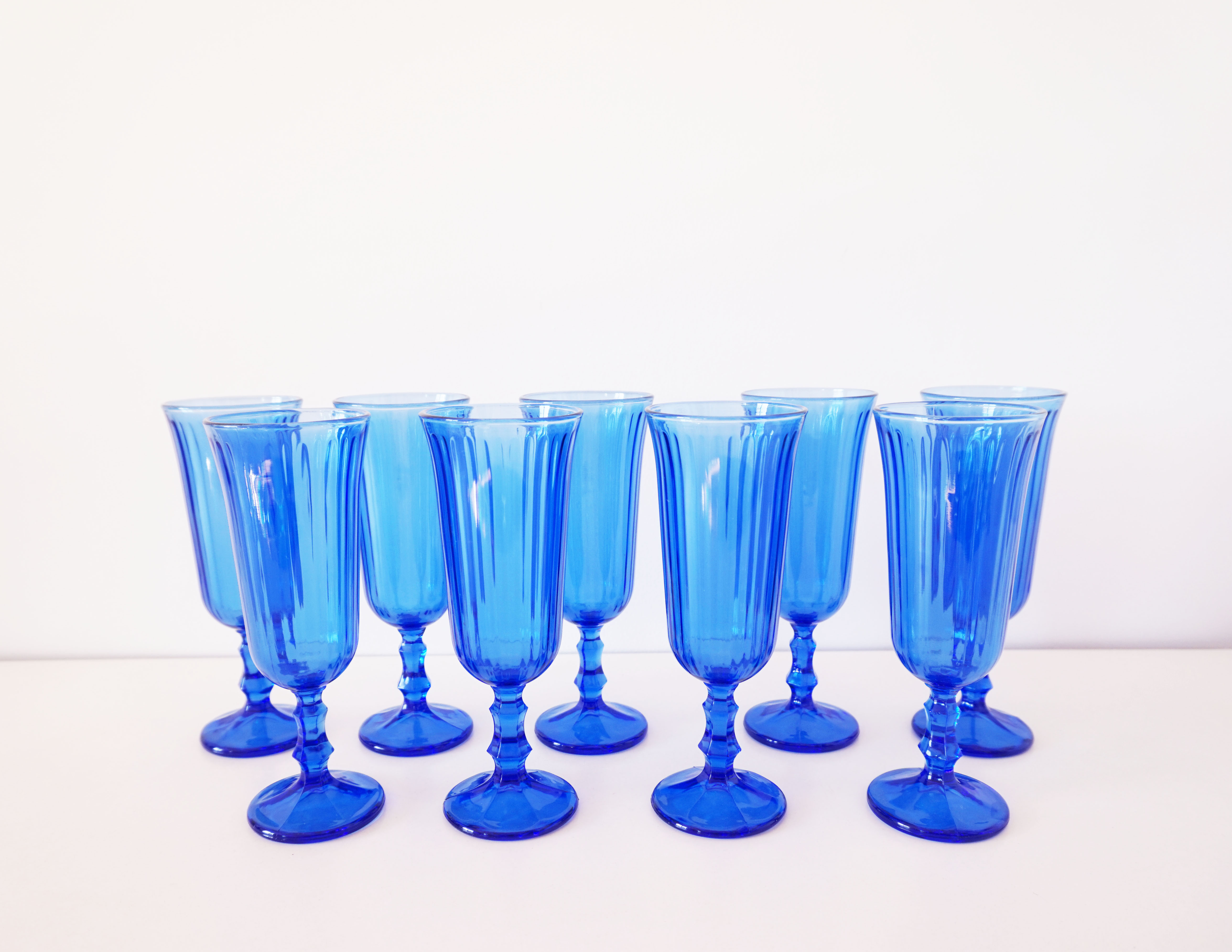Set of 9 blue champagne flutes