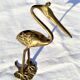 Heron or brass wading bird around the 1960s/1970s