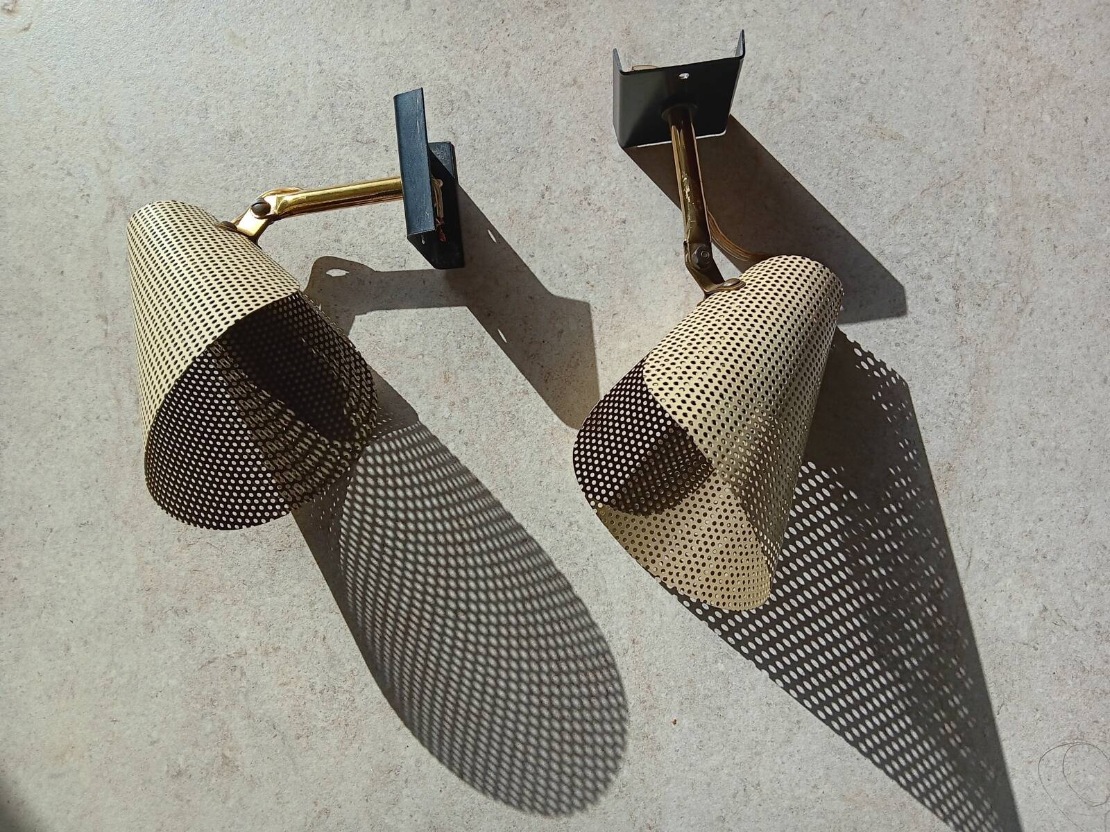 Pair of perforated metal horn wall lights
