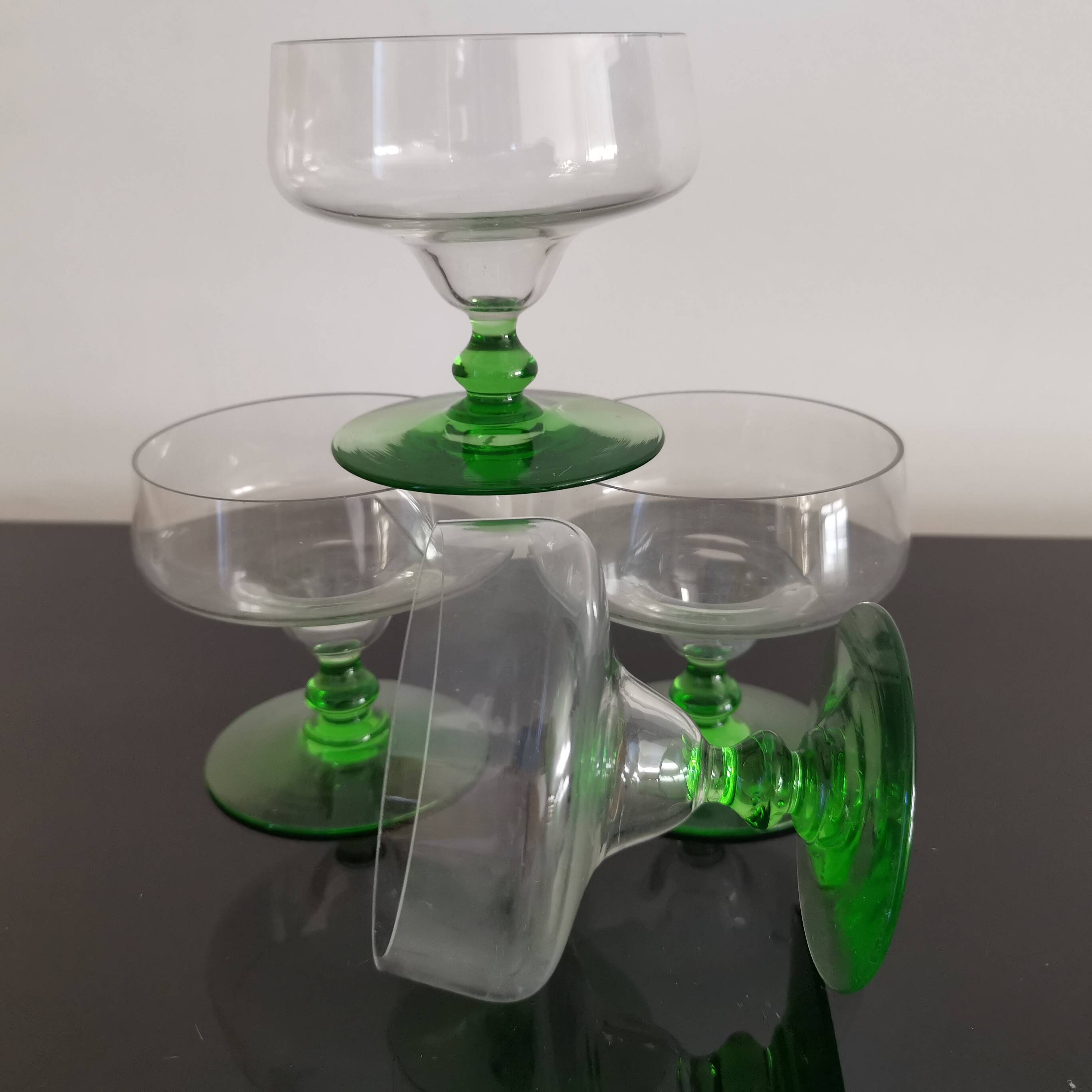 Set of 4 champagne glasses on green legs, 1960s