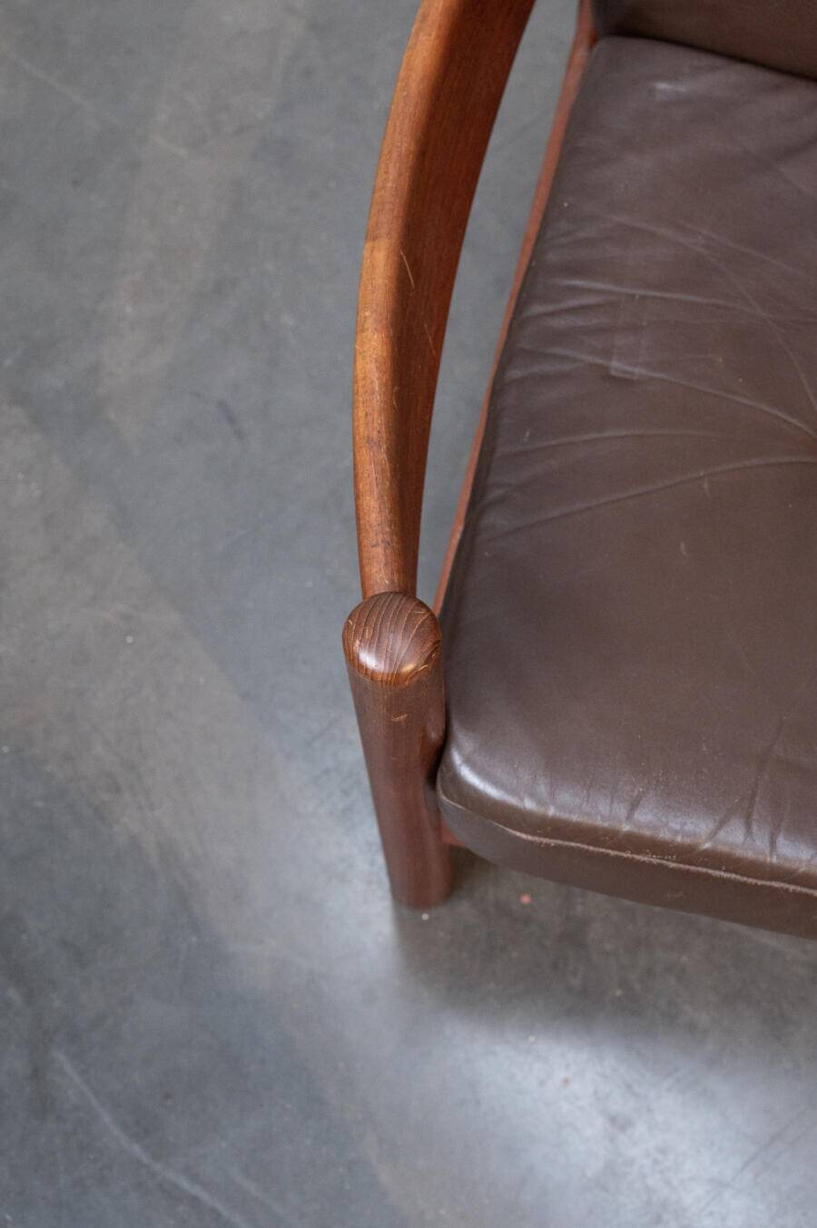 Teak and leather armchair